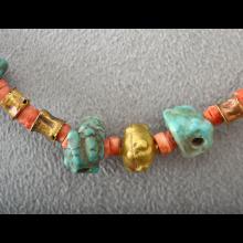 Collier de fouilles or, turquoise et spondyle